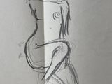 drawing of a woman sitting on a chair in a room
