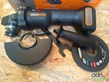 a cordless drill and a circular cutter on a table