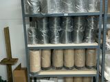 many rolls of thread on the shelves in the room