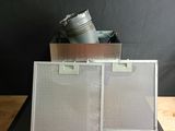 a picture of a stove top with a venter on top of it