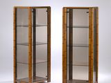 pair of art deco bamboo and glass display cabinets