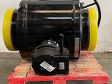 a black and yellow blower sitting on a wooden pallet