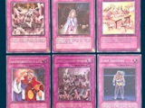 several cards of different types of card games on a blue background