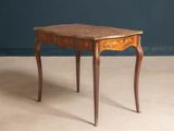 an image of a small table with a wooden top and legs