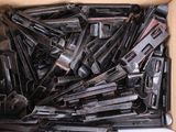 a box full of guns that are sitting on a table
