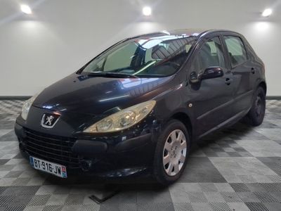 a picture of a black car parked in a garage