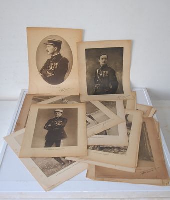 many old photos of men in military uniforms on a table