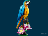 a lego parrot that is sitting on top of a flower