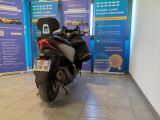 a motorcycle that is parked in a showroom