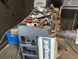 a machine that is sitting in a room with tools