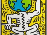 une affiche représentant une personne tenant un globe terrestre