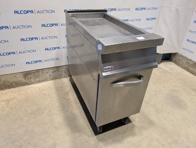 an image of a stainless steel dishwasher sitting in a room