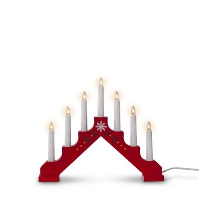 une menorah rouge et blanche sur laquelle sont disposées des bougies