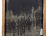 an old picture of a black and white painting on a wooden frame