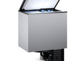 a silver chest freezer sitting on top of a white surface