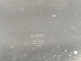 silver plate with the word alessi engraved on it