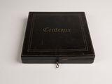an old black box with the word constan written on it