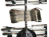 many forks and spoons that are on a rack