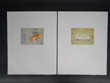 an image of two paintings on a black surface with a black background