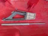 a picture of a tool that is laying on a red box