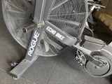 a close up of a fan on a stationary bike in a gym