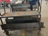 an image of a metal cart in a warehouse