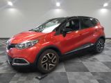 a red renault c - cross parked on a checkered floor