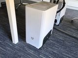 an image of a desk with a computer on top of it