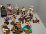 a lot of figurines that are sitting on a table