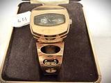 a watch that is sitting in a case on a table