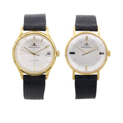 two gold watches with black leather straps and white dials