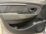 a close up of a car door with a speaker in it