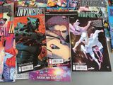 a lot of comic books that are on the table