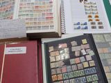 many different types of stamps on the table