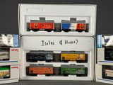 a box with a train set in it and a box with a train set in it
