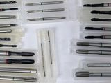 many different types of screws in a plastic case