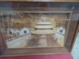 la photo d'une photo d'un bâtiment exposée dans une vitrine