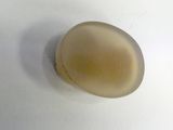 a piece of soap sitting on top of a white table