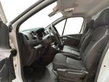 the interior of a white van with black leather seats and a steering wheel