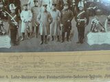 an old photo of a group of people standing in front of a horse drawn carriage