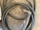 a power cord and a power strip on the floor