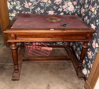 a wooden table with a magazine rack on top of it