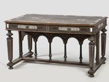 an old wooden table with two drawers and a marble top