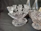 three glass vases sitting on a table next to each other
