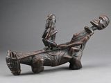 an old bronze figurine of a man on a horse