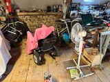 a small room with a lot of stuff on the floor