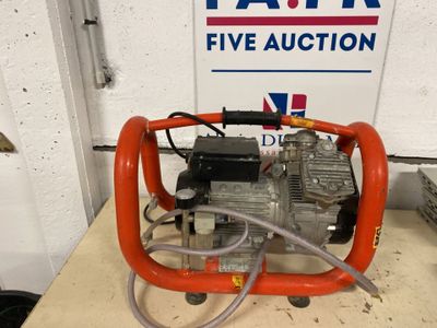 a small pump that is sitting on a table