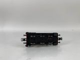the toy train is sitting on a white surface with a white background