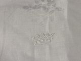 a close up of a piece of cloth with a crown on it