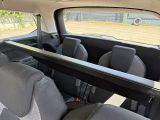 a picture of the inside of a car with the seats down